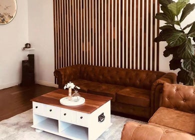 Elegant lounge area at Black Swan Asian Massage Hobart, featuring plush sofas in Hobart, Tasmania, AU.