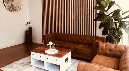 Elegant lounge area at Black Swan Asian Massage Hobart, featuring plush sofas in Hobart, Tasmania, AU.
