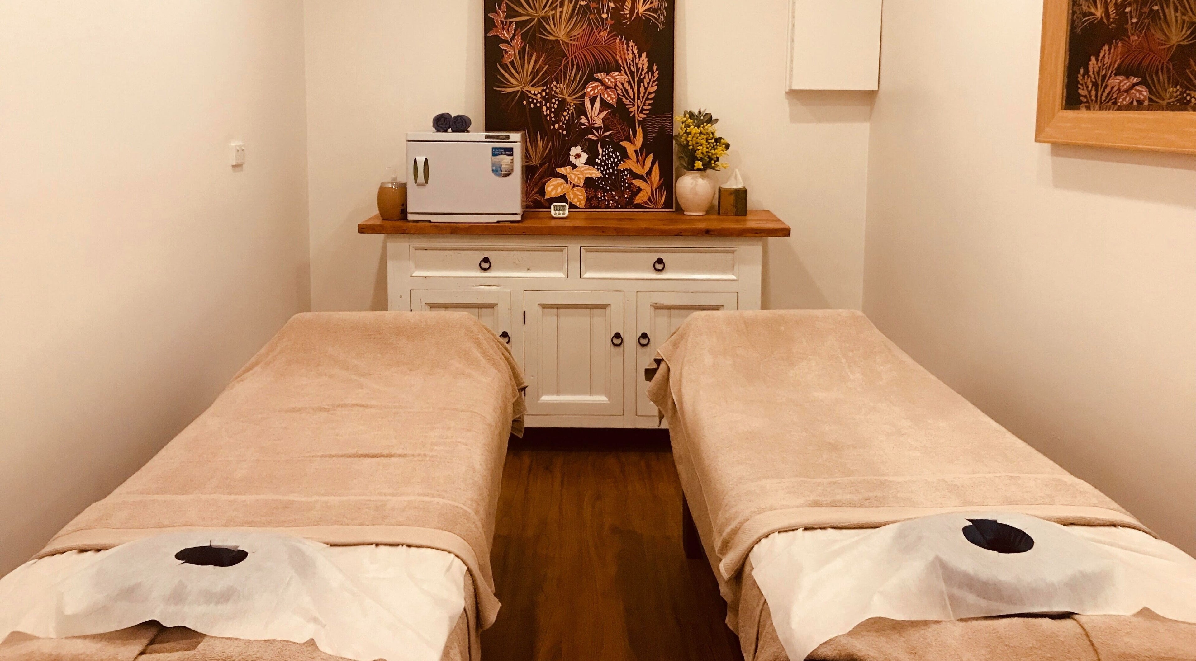 Relaxing massage room at Black Swan Asian Massage Hobart, Tasmania, AU with two comfortable massage tables.