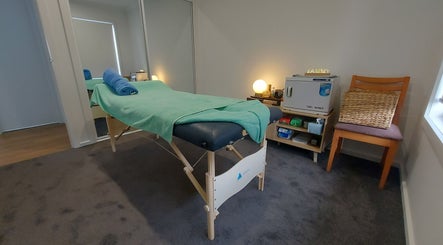 Tranquil massage room at Shu's Massage Therapy In Mernda, Melbourne, Victoria, AU with massage table.