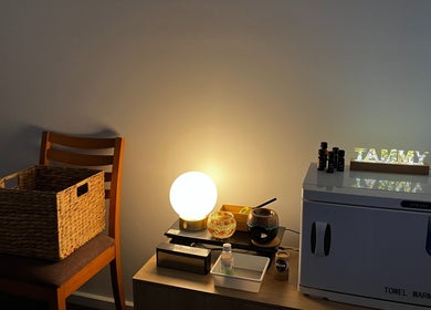 Cozy massage setup at Shu's Massage Therapy In Mernda, Melbourne, Victoria, AU with warm lighting and oils.