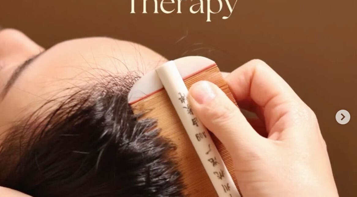 Scalp therapy at Inverse Time Beauty in Kuala Lumpur, MY. Traditional comb technique promotes relaxation.