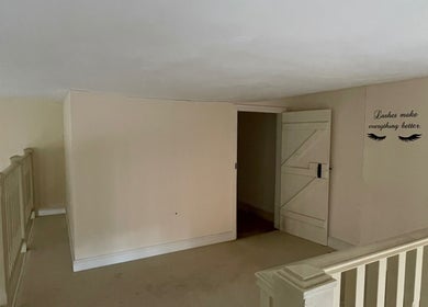 Tranquil space at The Beauty Ritualist | Wellness Clinic in Ipswich, England with inspiring wall art.