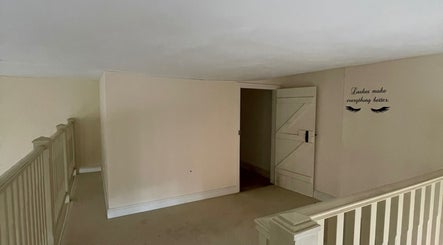 Tranquil space at The Beauty Ritualist | Wellness Clinic in Ipswich, England with inspiring wall art.