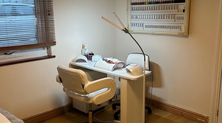 Elegant nail station at Homespa Nails & Beauty, Saint Columb, England, GB, ready for a luxurious manicure.