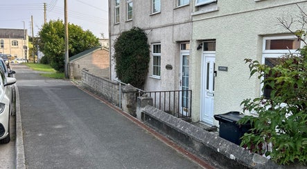 Exterior view of Homespa Nails & Beauty at Saint Columb, England, showcasing the venue's welcoming entrance.