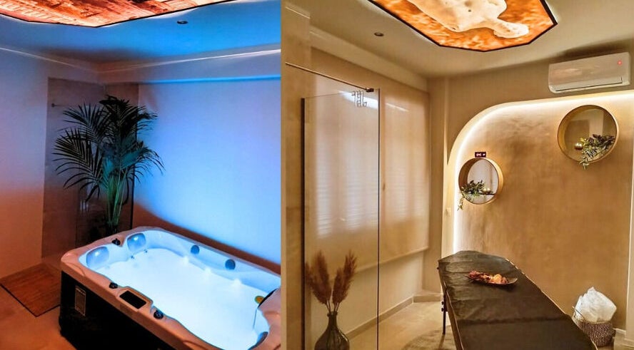 Χαλάρωση στο En Athinais Massage, Αθήνα, GR: τζακούζι και κομψό δωμάτιο θεραπείας.