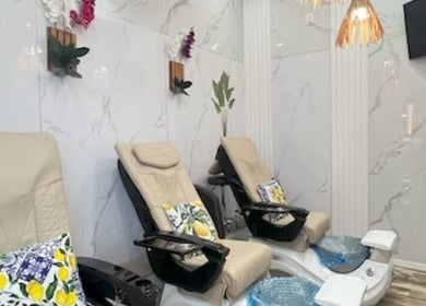 Luxurious pedicure chairs at Island Nail Lounge, Houston, Texas, US for ultimate relaxation.
