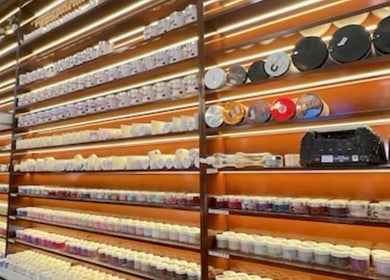 Vibrant nail products wall at Island Nail Lounge, Houston, Texas, US.