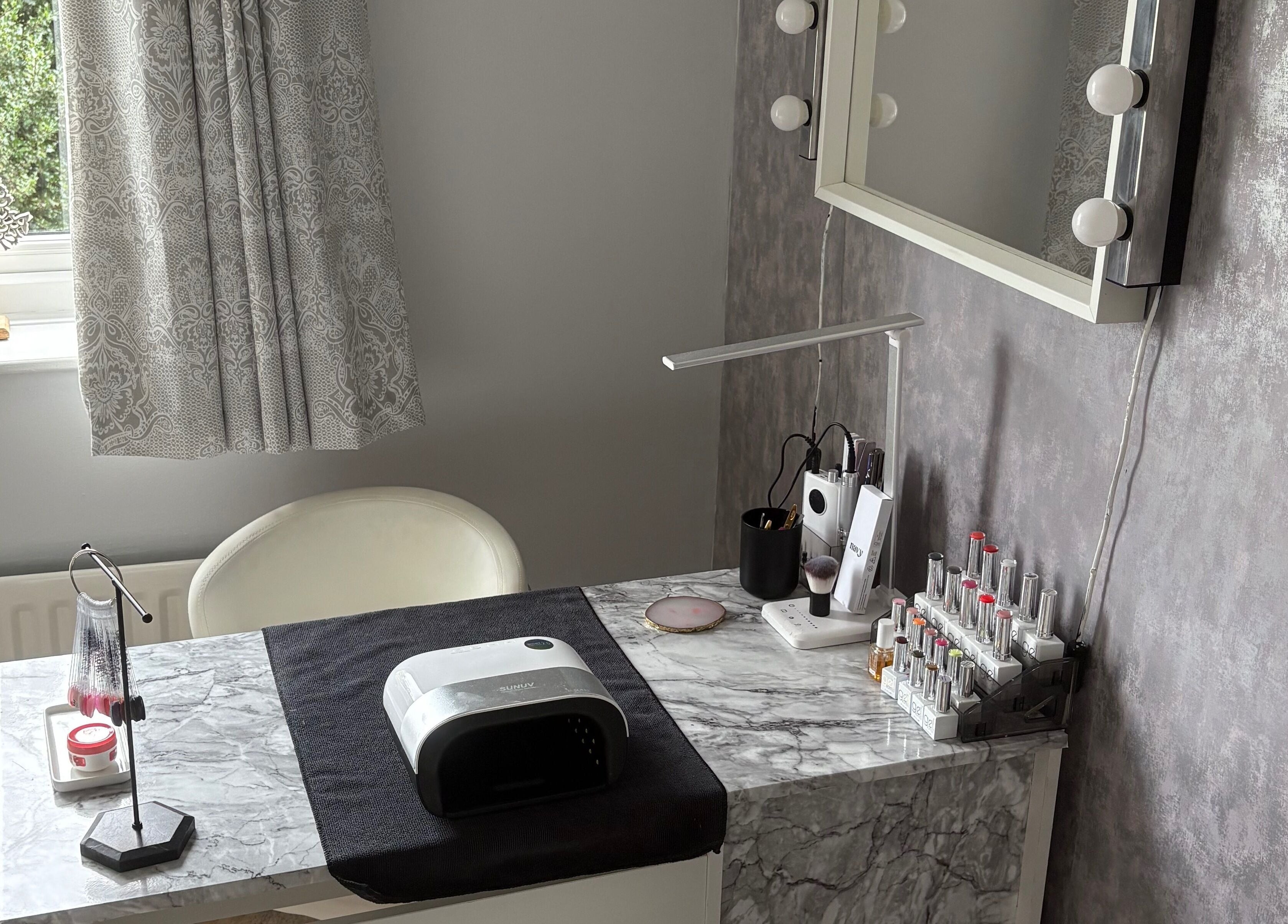 Chic beauty station at LR Beauty, Mossley, England, GB with elegant decor and nail polish display.