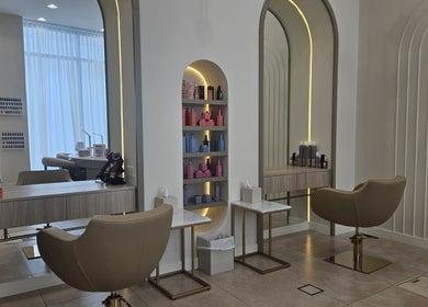 Sophisticated styling stations at Dilara Beauty Salon, دبي, دبي, AE featuring sleek, modern design elements.