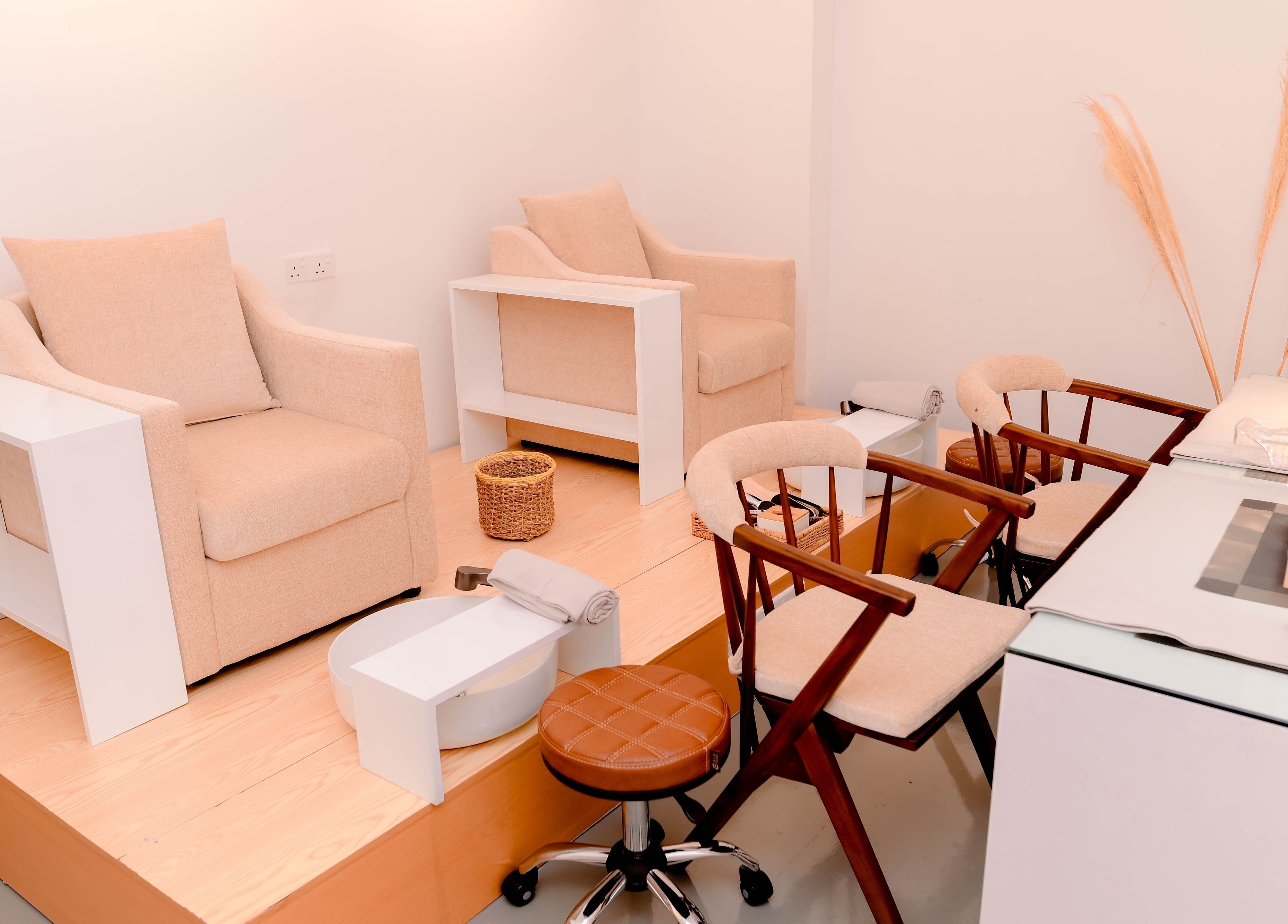 Comfortable pedicure seating at Lilly's, Colombo, Western Province, LK, with warm tones and modern design.