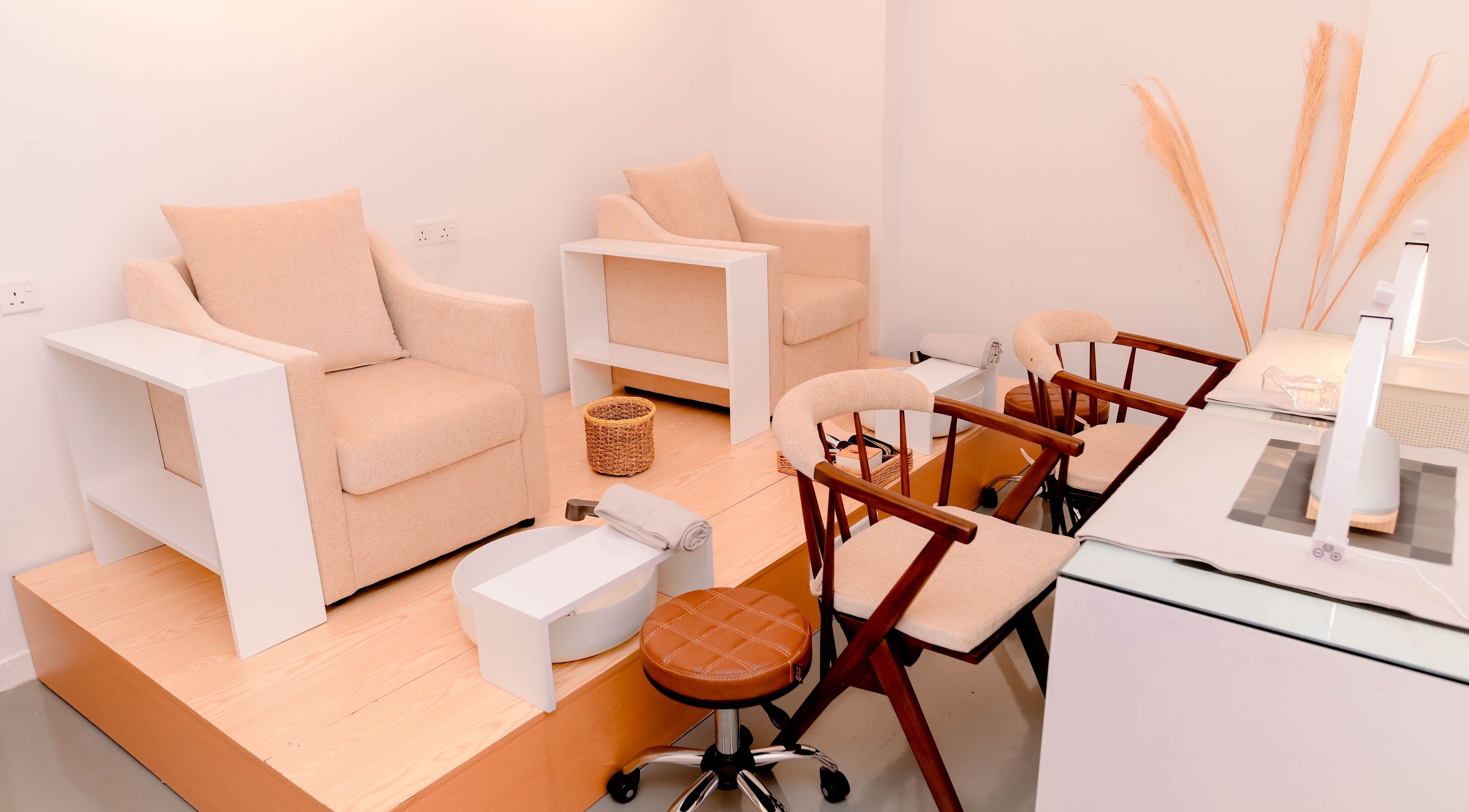 Comfortable pedicure seating at Lilly's, Colombo, Western Province, LK, with warm tones and modern design.