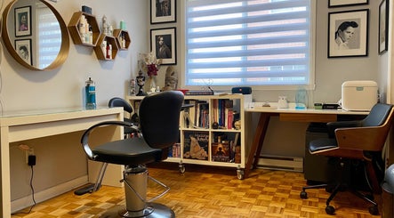 HAIRBÜRY salon interior featuring stylish decor and seating in Montréal, Québec, CA.