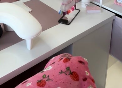 Nail station with vibrant colors and decor at Nails by Grace, Gosport, England, GB.