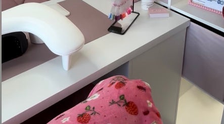 Nail station with vibrant colors and decor at Nails by Grace, Gosport, England, GB.