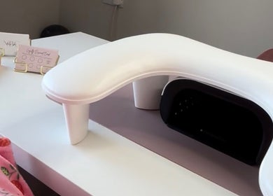 Manicure station at Nails by Grace in Gosport, England, GB, showcasing a sleek table and tools.