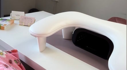 Manicure station at Nails by Grace in Gosport, England, GB, showcasing a sleek table and tools.