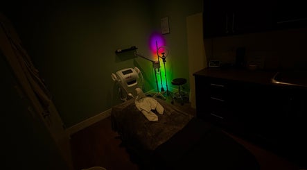 Tranquil treatment room at Glow & Grace Esthetics, Calgary, Alberta, CA, featuring soft lighting and a cozy ambiance.