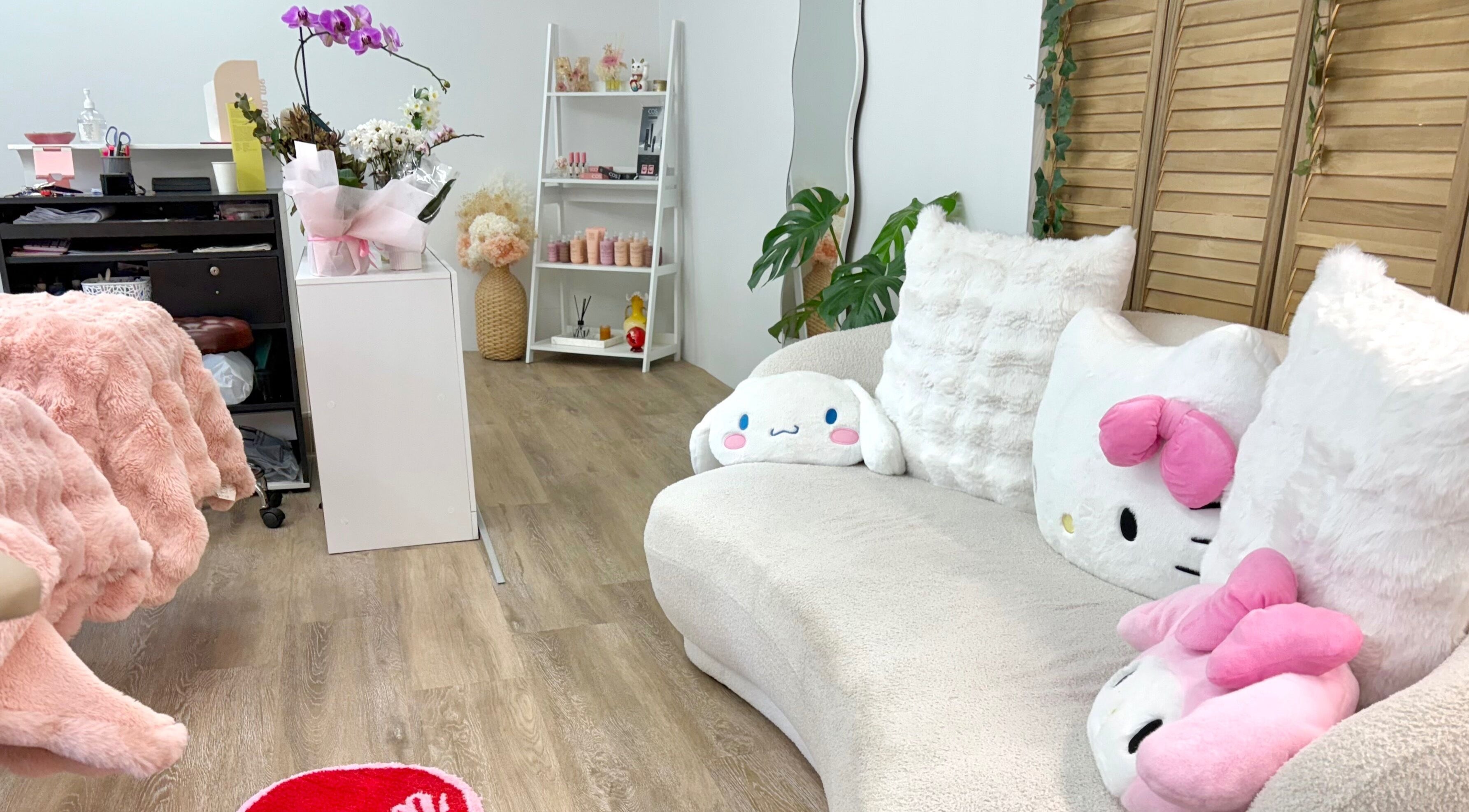 Cozy seating area at KAIZEN, Pyrmont, New South Wales, AU featuring plush cushions and decor.