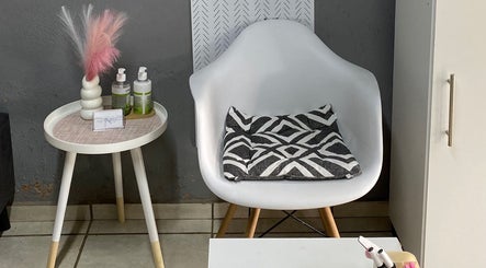 Cozy nail lounge at Nailcraftsbynene, Pretoria, Gauteng, ZA with modern chair and stylish decor.