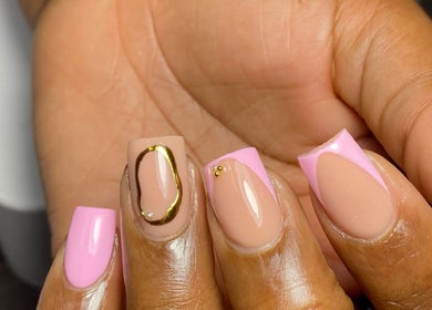 Stylish pink and nude nail design at Nailcraftsbynene in Pretoria, Gauteng, ZA.
