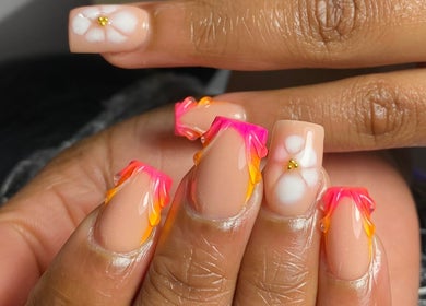 Bright floral and ombre nails at Nailcraftsbynene, Pretoria, Gauteng, ZA, showcasing expert nail artistry.