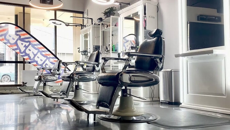 Modern barber chairs at Silk Barbershop Carnegie, Melbourne, Victoria, AU, creating a stylish and inviting atmosphere.