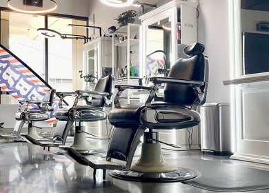 Modern barber chairs at Silk Barbershop Carnegie, Melbourne, Victoria, AU, creating a stylish and inviting atmosphere.