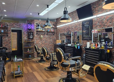 Interior of Weasley Traditional Barbershop in QLD, Queensland, AU with vintage chairs and décor.