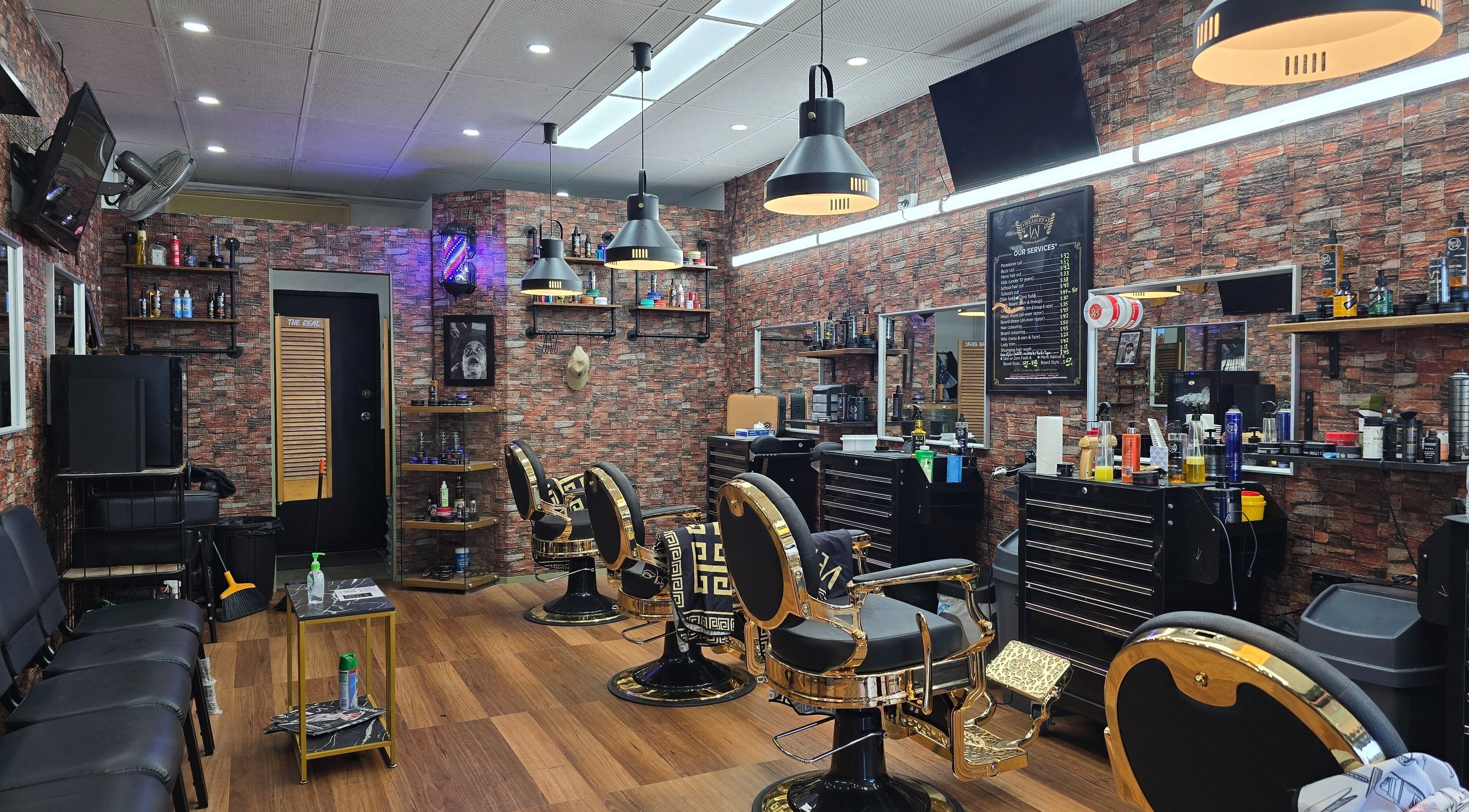Interior of Weasley Traditional Barbershop in QLD, Queensland, AU with vintage chairs and décor.