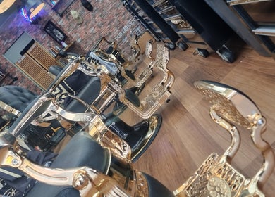 Luxurious barber chairs at Weasley Traditional Barbershop, QLD, Queensland, AU showcasing elegance and comfort.