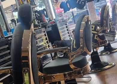 Luxurious barber chairs at Weasley Traditional Barbershop, QLD, Queensland, AU, showcasing classic style.