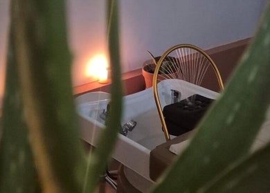 Relaxing ambiance at Maison Juline spa, featuring a soothing bath setup in Il-GZIRA, MT.