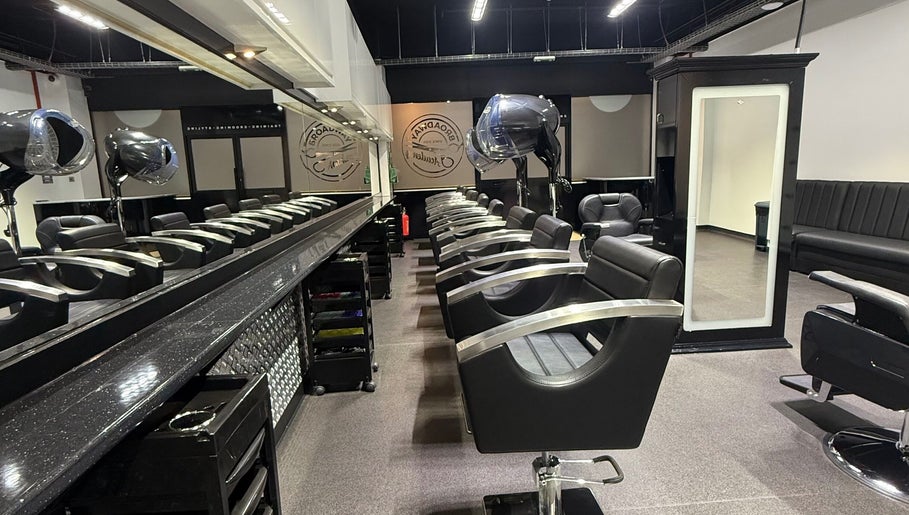 Modern salon chairs and mirrors at The Broadway Hair Salon, Worthing, England, GB enhancing style and comfort.