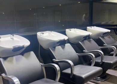 Comfortable wash stations at The Broadway Hair Salon, Worthing, England, GB, for a premium hair experience.