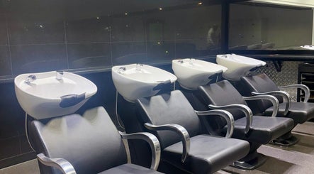 Comfortable wash stations at The Broadway Hair Salon, Worthing, England, GB, for a premium hair experience.