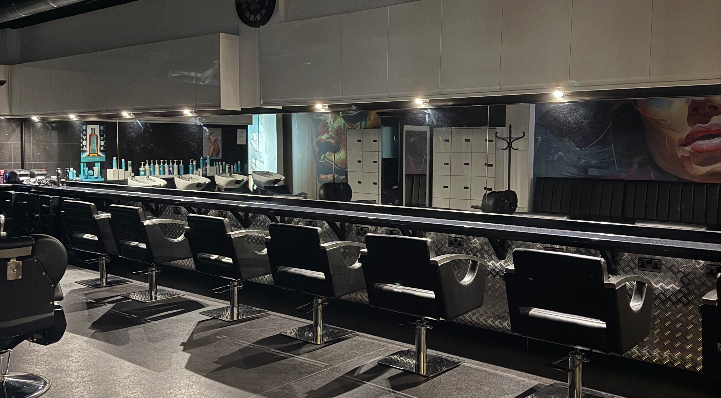 Modern styling chairs and wash stations at The Broadway Hair Salon in Worthing, England, GB.