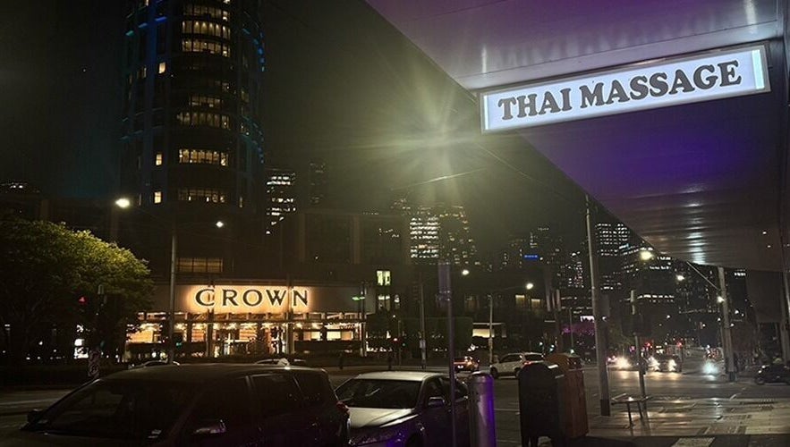 Night view of Ba Yha Thai Massage, Melbourne, Victoria with city lights.