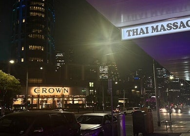 Night view of Ba Yha Thai Massage, Melbourne, Victoria with city lights.