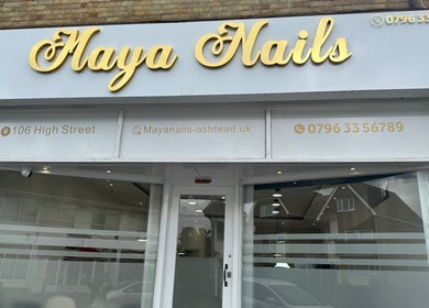 Front view of Maya Nails salon in Ashtead, England, showcasing elegant signage.