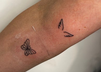Delicate butterfly tattoo from Haven Ink & Beauty Studio, Perth, Western Australia, AU, on a forearm.