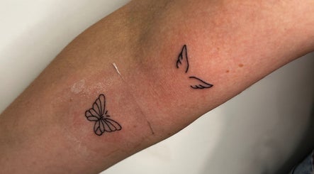 Delicate butterfly tattoo from Haven Ink & Beauty Studio, Perth, Western Australia, AU, on a forearm.