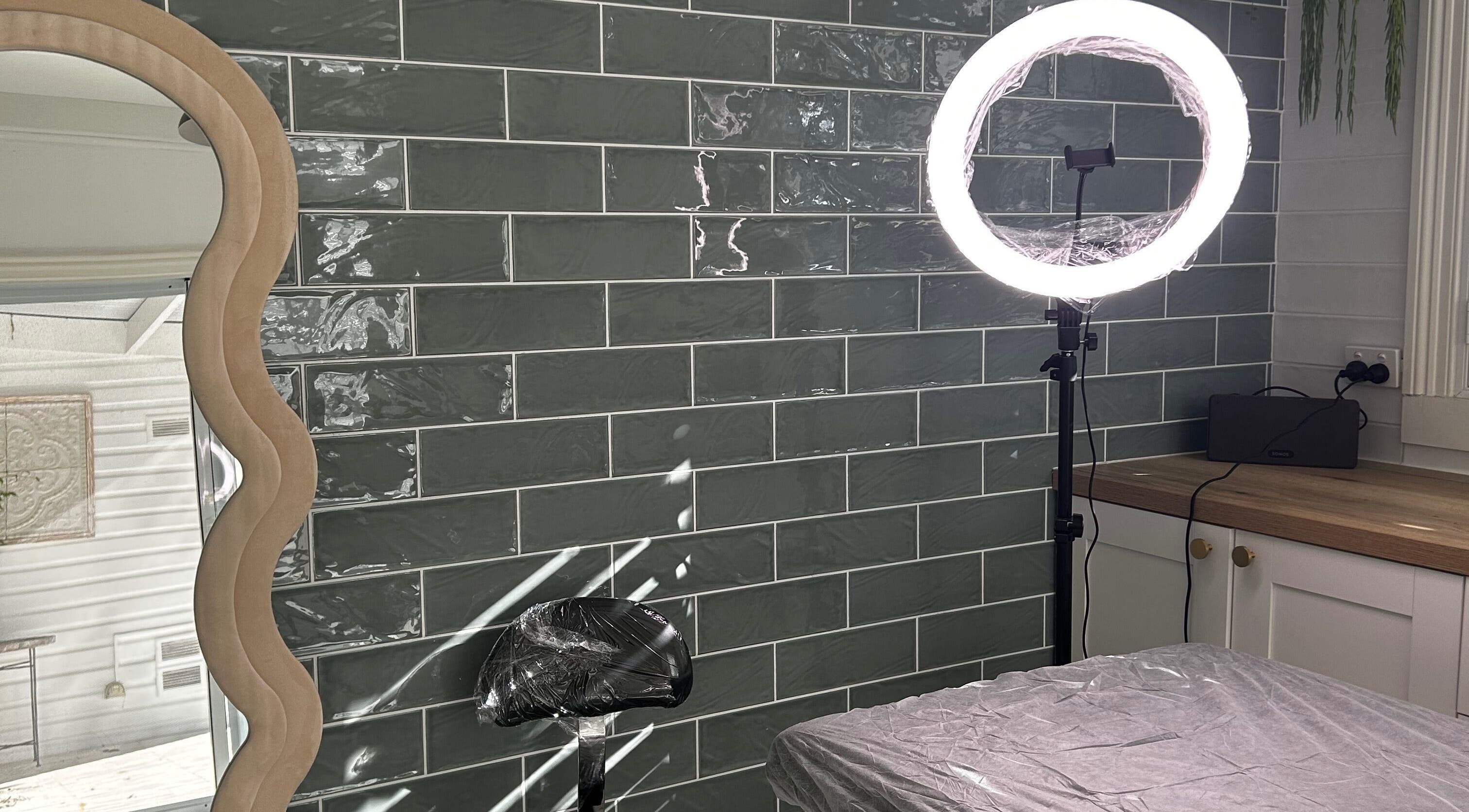 Modern setup at Haven Ink & Beauty Studio, Dawesville, Western Australia, AU with mirror and ring light.