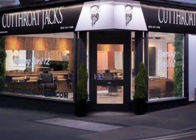 Exterior view of Cutthroat Jacks in Stockport, England, GB with stylish signage and modern decor.