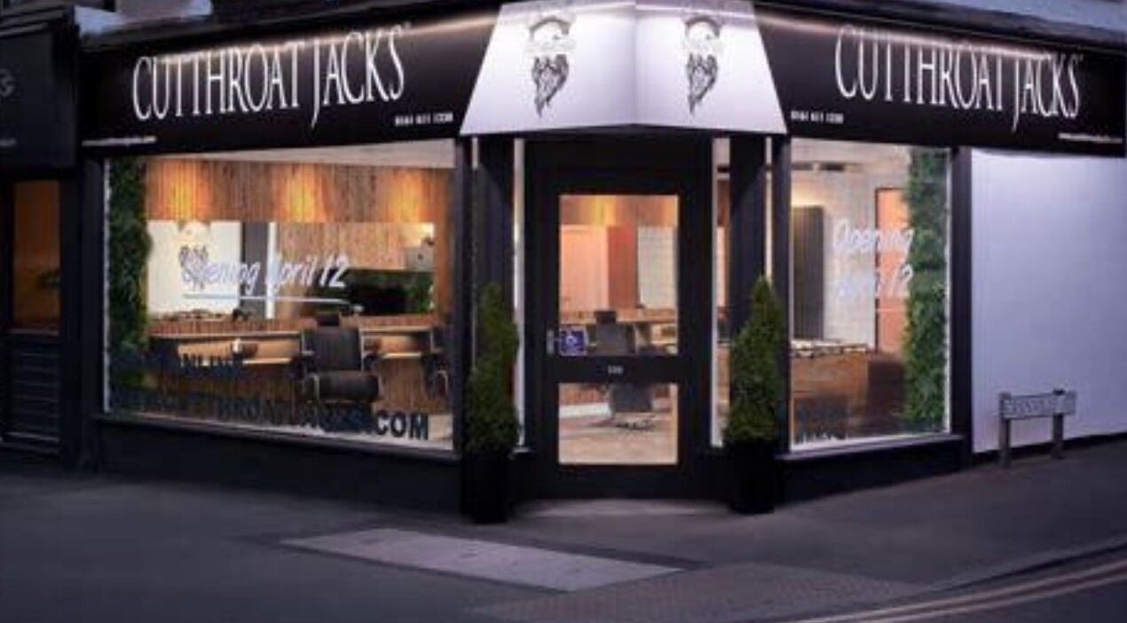 Exterior view of Cutthroat Jacks in Stockport, England, GB with stylish signage and modern decor.