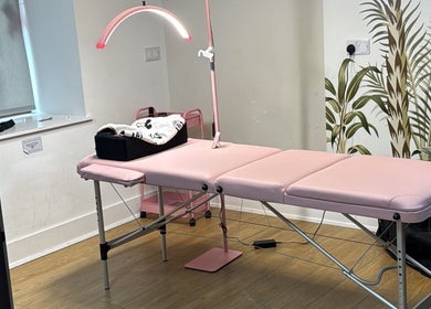 Relaxing treatment bed at Ellas Beauty Haven in Aberchirder, Scotland, GB, with calming decor.