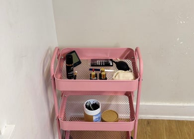 Pink beauty cart with cosmetics at Ellas Beauty Haven, Aberchirder, Scotland, GB.