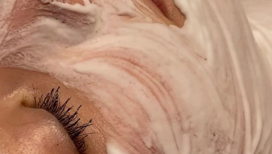 Relaxing facial treatment at Veluxe Skin, Manchester, England, GB with a soothing cream mask.