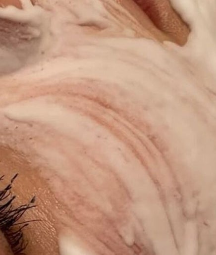 Relaxing facial treatment at Veluxe Skin, Manchester, England, GB with a soothing cream mask.